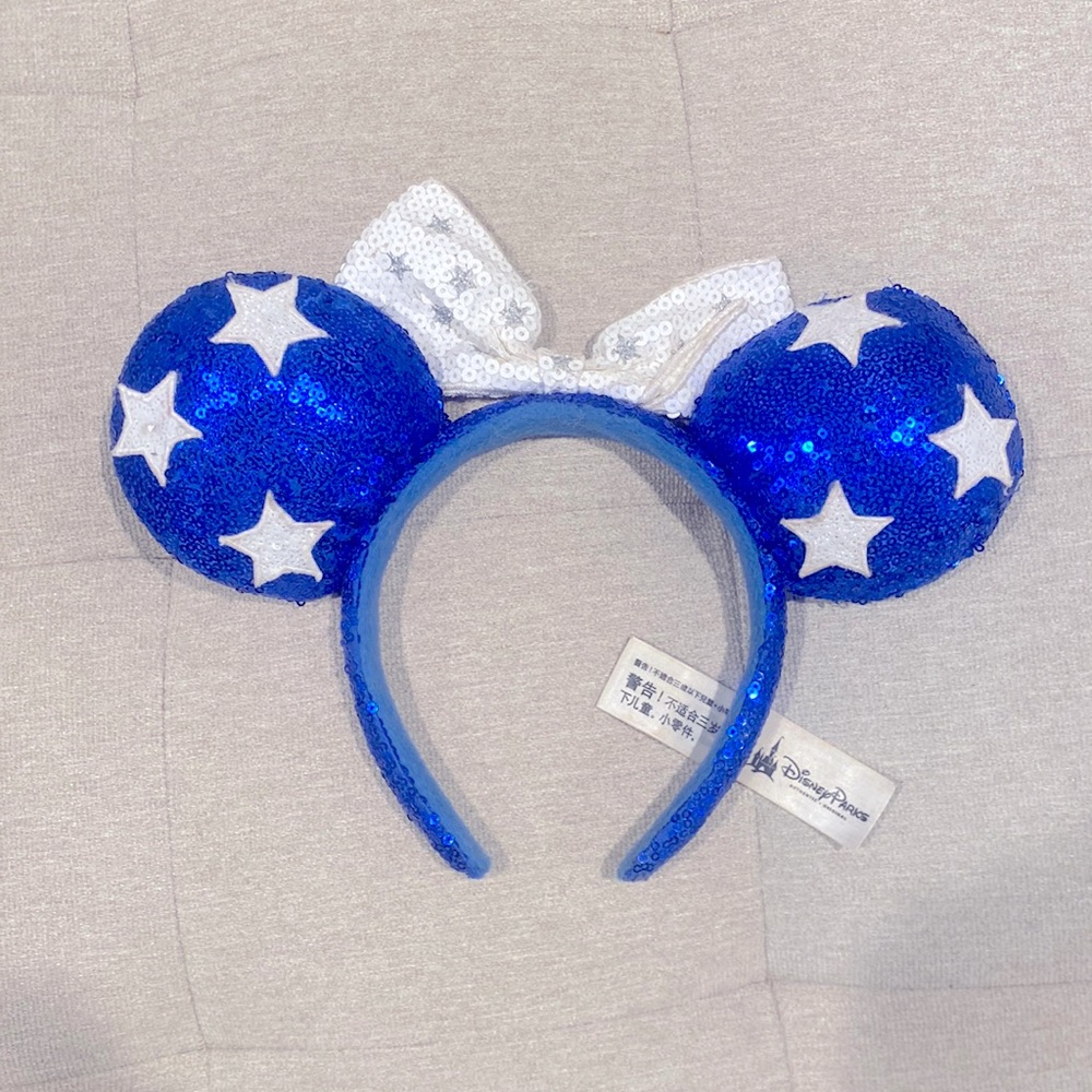 Blue official mickey mouse head band.